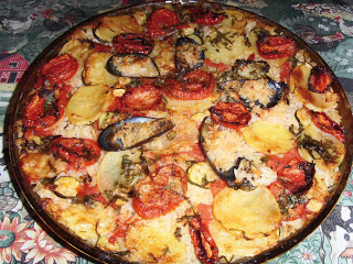 Read more about the article Dalla Puglia: Tiella di riso cozze e patate